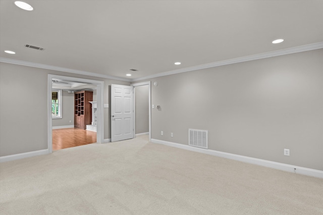 3997 Hammonds Fry, Evans, GA 30809 - unfurnished bedroom with light colored carpet, crown molding, and recessed lighting