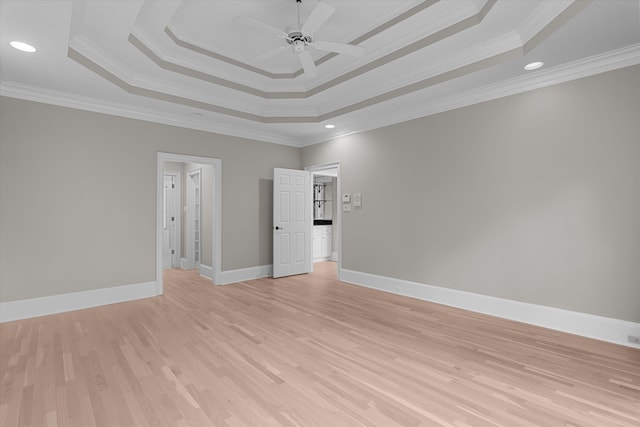 3997 Hammonds Fry, Evans, GA 30809 - spare room featuring a raised ceiling, ceiling fan, light wood finished floors, crown molding, and recessed lighting