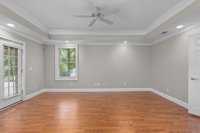 3997 Hammonds Fry, Evans, GA 30809 - spare room featuring ceiling fan, wood finished floors, crown molding, recessed lighting, and a raised ceiling