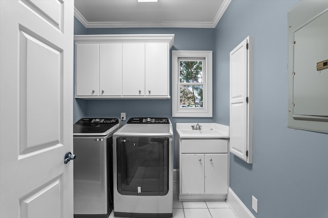 3997 Hammonds Fry, Evans, GA 30809 - laundry room featuring cabinet space, washing machine and clothes dryer, light tile patterned floors, and crown molding
