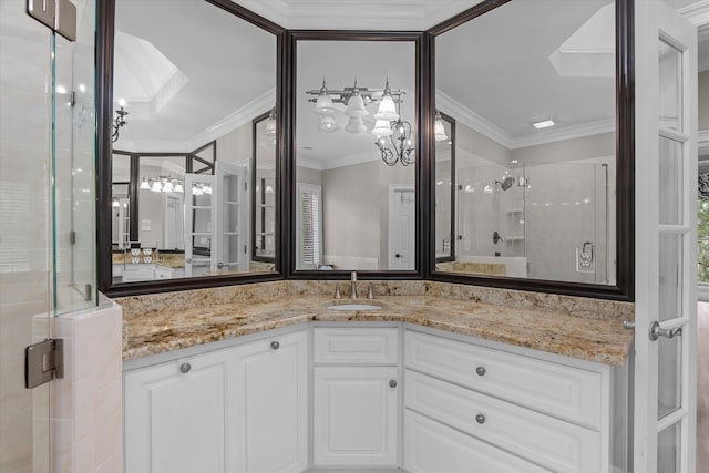 3997 Hammonds Fry, Evans, GA 30809 - bathroom featuring a shower stall, vanity, ornamental molding, and a chandelier