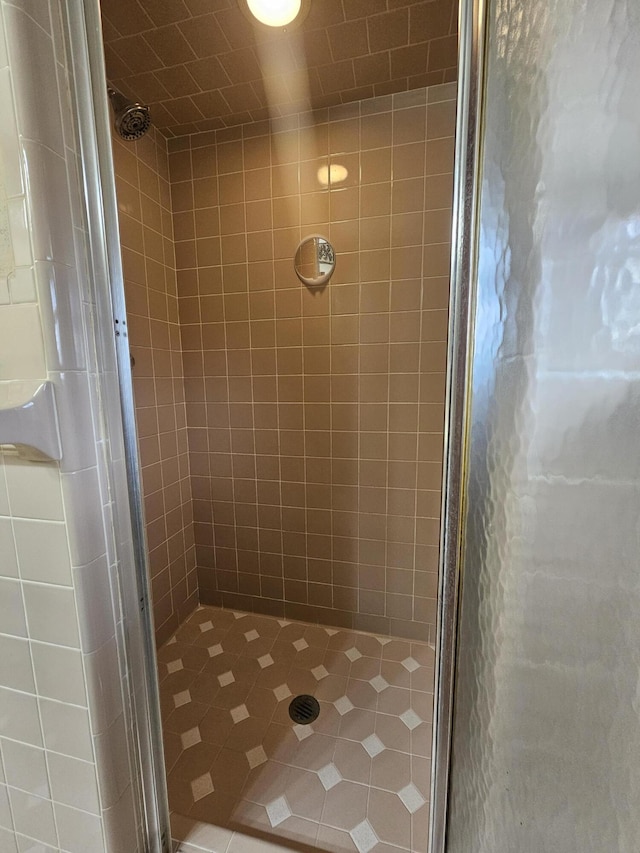 full bathroom with a stall shower