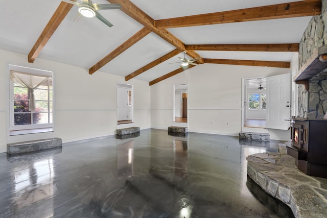 5131 Deans Bridge Rd, Blythe, GA 30805 - living area featuring a ceiling fan, finished concrete floors, a wood stove, and baseboards
