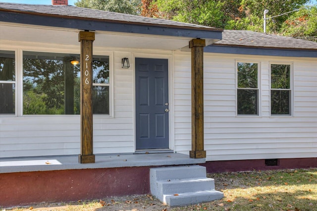 entrance to property with a porch