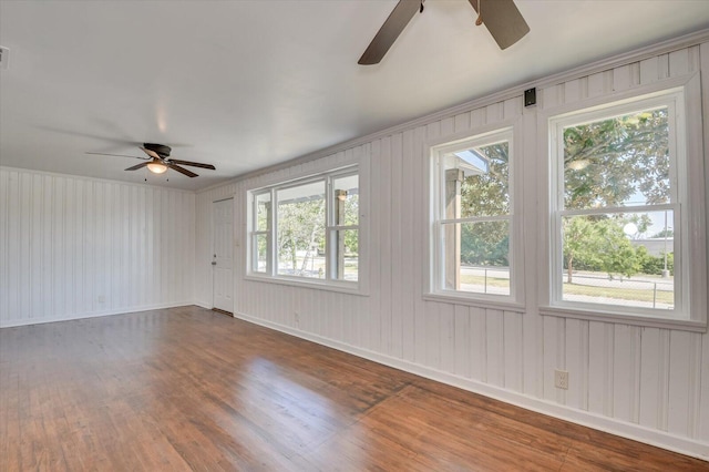 unfurnished room featuring hardwood / wood-style floors