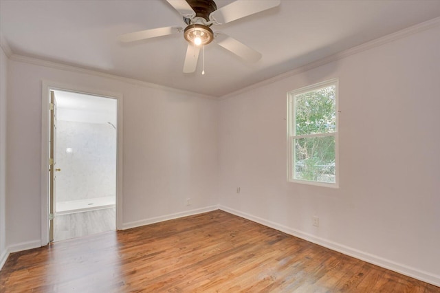 unfurnished room featuring light hardwood / wood-style floors, ceiling fan, and ornamental molding