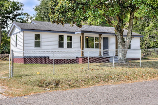 view of front of home with a front yard