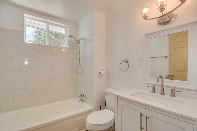 full bathroom featuring toilet, vanity, ornamental molding, and tiled shower / bath