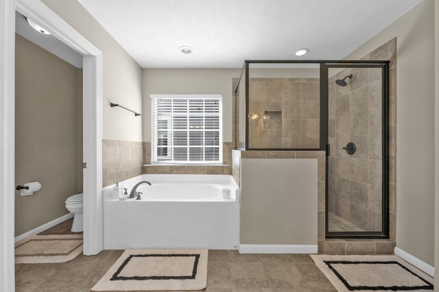 532 Bunchgrass St, Evans, GA 30809 - full bath featuring a bath, toilet, a shower stall, and recessed lighting
