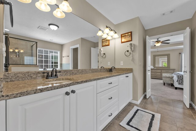 532 Bunchgrass St, Evans, GA 30809 - bathroom featuring ensuite bath, double vanity, a chandelier, tile patterned flooring, and baseboards