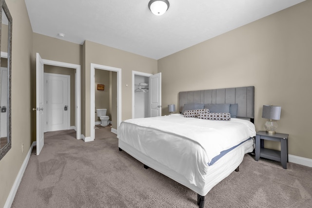 532 Bunchgrass St, Evans, GA 30809 - carpeted bedroom featuring baseboards and connected bathroom
