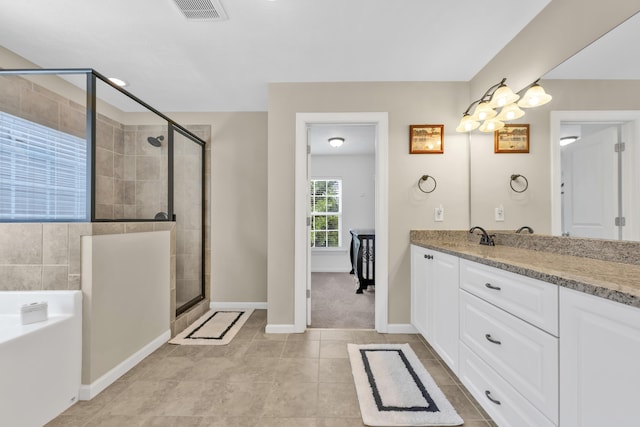 532 Bunchgrass St, Evans, GA 30809 - full bath featuring vanity, tile patterned flooring, a bath, a shower stall, and baseboards
