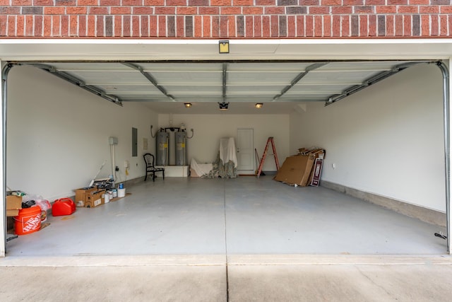 532 Bunchgrass St, Evans, GA 30809 - garage with electric water heater, a garage door opener, and electric panel