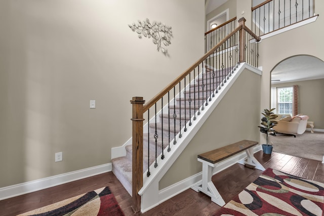 532 Bunchgrass St, Evans, GA 30809 - staircase with arched walkways, wood-type flooring, baseboards, and a towering ceiling
