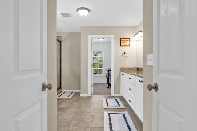 532 Bunchgrass St, Evans, GA 30809 - full bathroom with vanity, a stall shower, baseboards, and tile patterned flooring