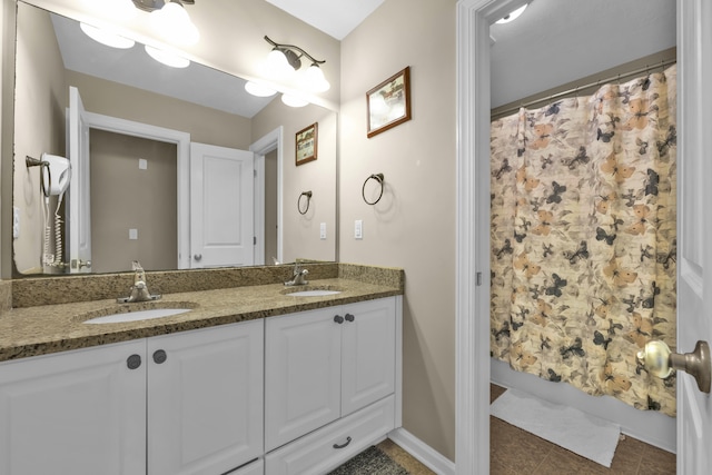 532 Bunchgrass St, Evans, GA 30809 - full bathroom featuring double vanity, tile patterned floors, and baseboards