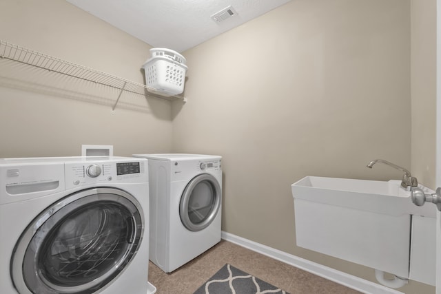 532 Bunchgrass St, Evans, GA 30809 - washroom featuring washing machine and dryer and baseboards