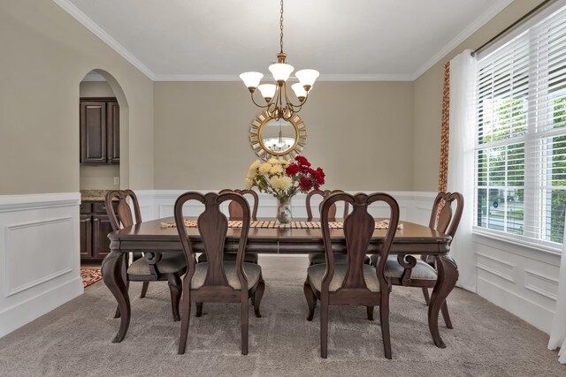 532 Bunchgrass St, Evans, GA 30809 - dining room with a chandelier, ornamental molding, light carpet, a decorative wall, and a wainscoted wall