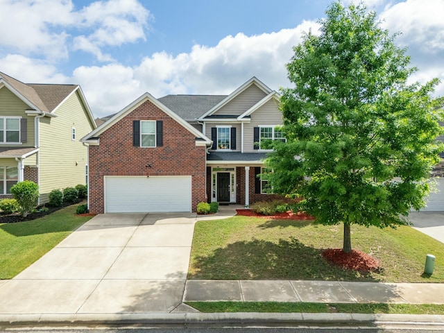 532 Bunchgrass St, Evans, GA 30809 - view of front facade featuring brick siding, concrete driveway, a garage, and a front lawn