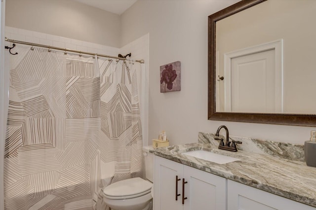 full bathroom with vanity, toilet, and shower / bath combo with shower curtain