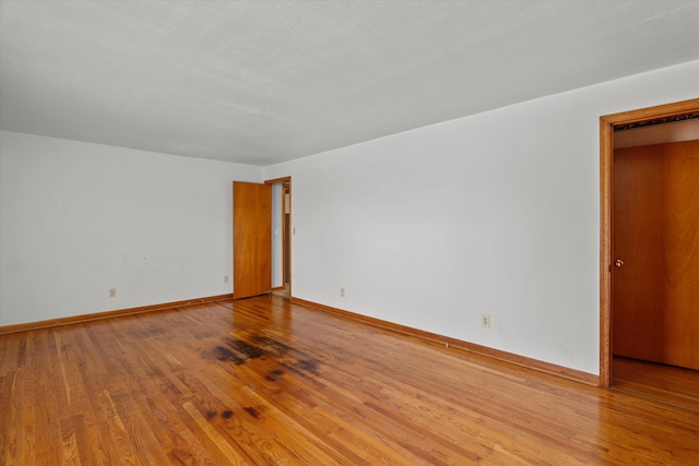 2211 Woodland Ave, Augusta, GA 30904 - unfurnished room with wood finished floors and baseboards