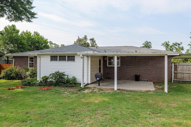 2211 Woodland Ave, Augusta, GA 30904 - rear view of property featuring a patio area and brick siding