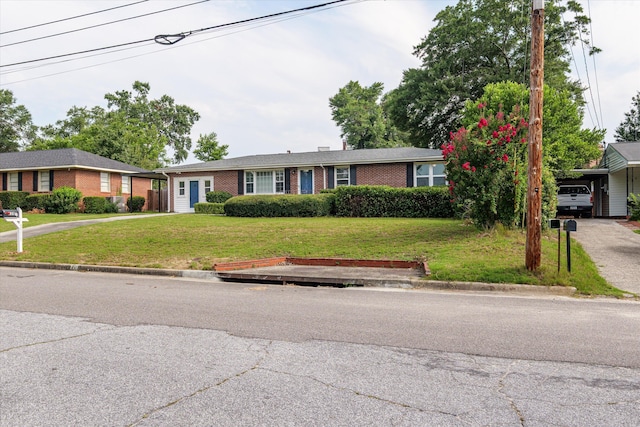 2211 Woodland Ave, Augusta, GA 30904 - single story home featuring driveway, brick siding, and a front yard