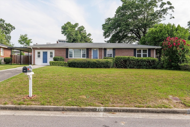 2211 Woodland Ave, Augusta, GA 30904 - ranch-style home with brick siding, driveway, and an attached carport