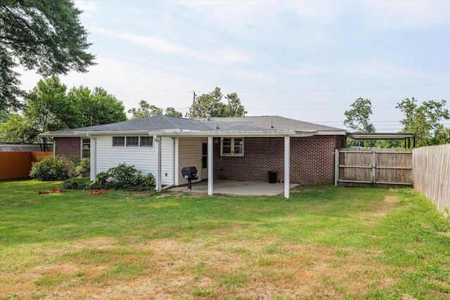 2211 Woodland Ave, Augusta, GA 30904 - back of house with a patio area and brick siding