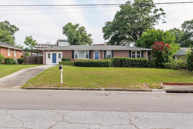2211 Woodland Ave, Augusta, GA 30904 - ranch-style house with brick siding, concrete driveway, and a carport