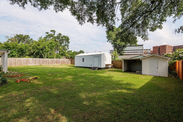 2211 Woodland Ave, Augusta, GA 30904 - fenced backyard with a storage unit