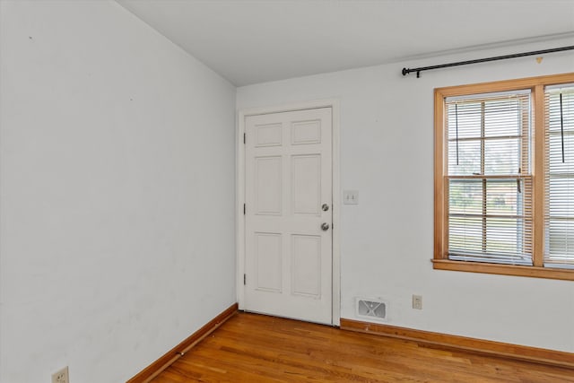 2211 Woodland Ave, Augusta, GA 30904 - foyer entrance featuring light wood finished floors and baseboards