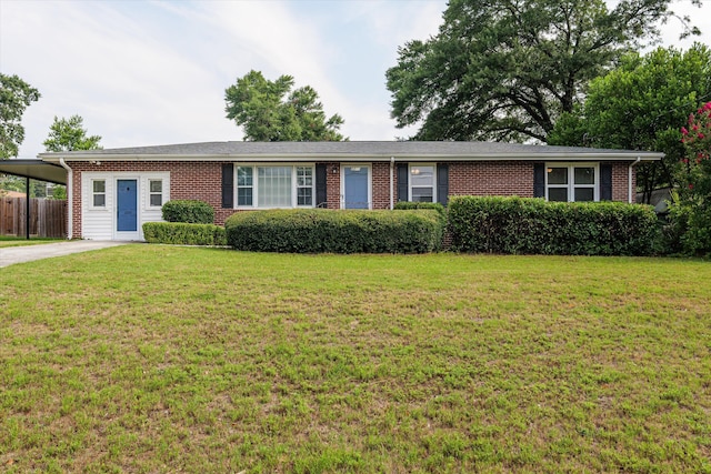 2211 Woodland Ave, Augusta, GA 30904 - single story home featuring brick siding, a carport, and driveway