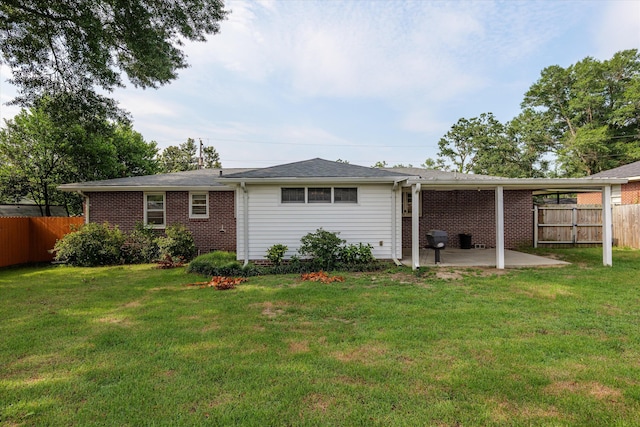 2211 Woodland Ave, Augusta, GA 30904 - back of house with a patio area and brick siding