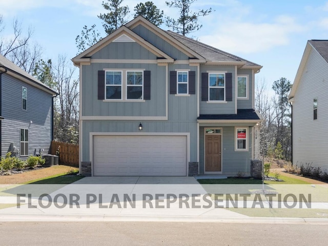 craftsman-style home featuring central AC unit, board and batten siding, concrete driveway, and an attached garage