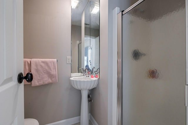 3665 Bay Point Ct, Martinez, GA 30907 - bathroom with a stall shower and toilet