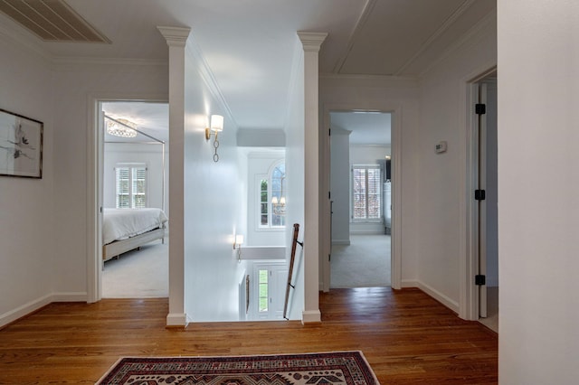 3665 Bay Point Ct, Martinez, GA 30907 - hallway featuring ornamental molding, wood finished floors, and an upstairs landing