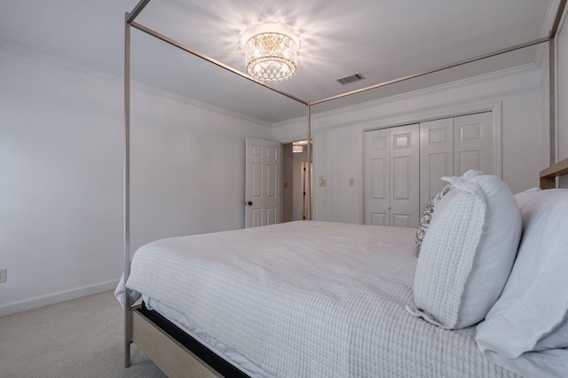 3665 Bay Point Ct, Martinez, GA 30907 - carpeted bedroom featuring ornamental molding, a closet, and a chandelier