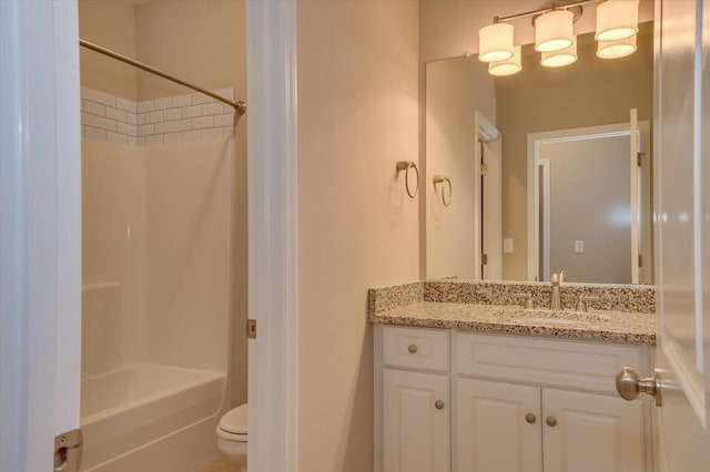 full bath featuring shower / bath combination, vanity, and toilet