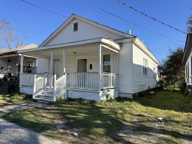 2021 Ellis St, Augusta, GA 30904 - view of front of home featuring a porch and a front lawn