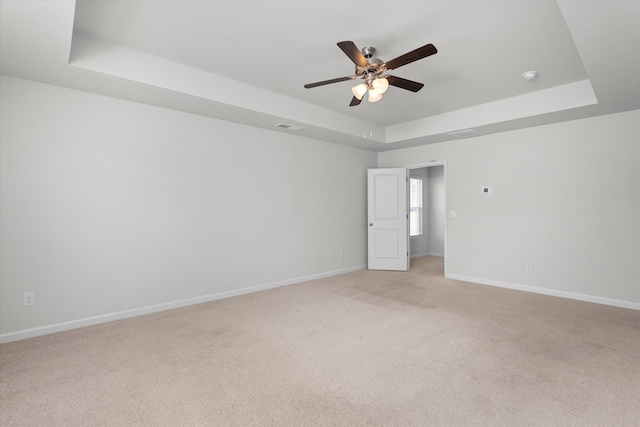 2965 Calli Crossing Dr, Graniteville, SC 29829 - spare room with a raised ceiling, a ceiling fan, light colored carpet, and a smoke detector