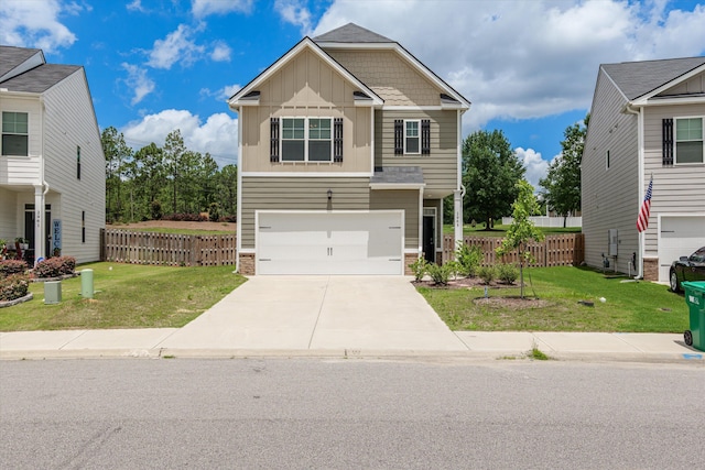 2965 Calli Crossing Dr, Graniteville, SC 29829 - view of front of property featuring board and batten siding, a garage, and driveway