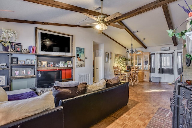 living room with ceiling fan with notable chandelier, light parquet flooring, and lofted ceiling with beams