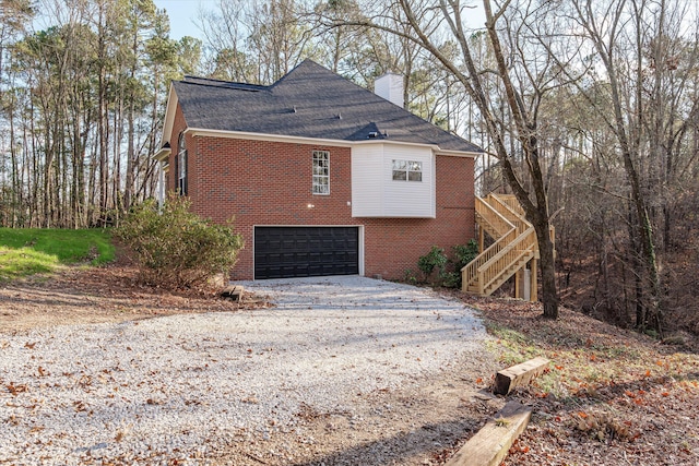 view of property exterior featuring a garage