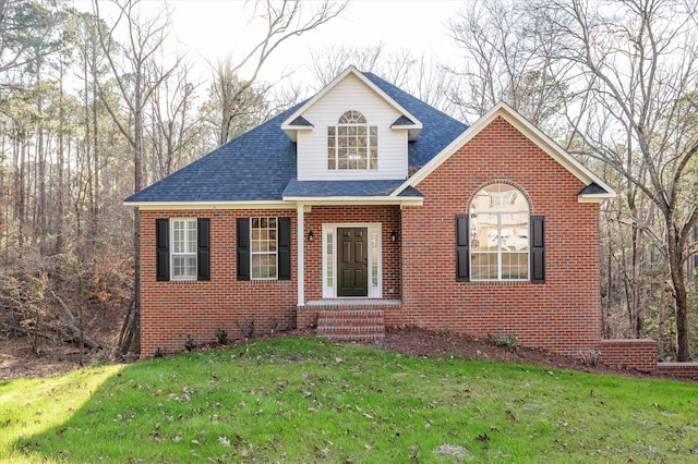 view of front of property with a front lawn