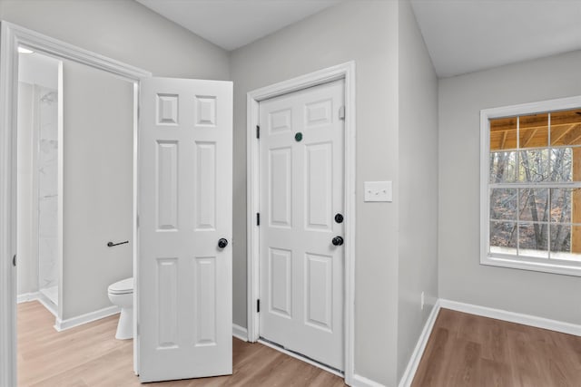 foyer with light hardwood / wood-style floors