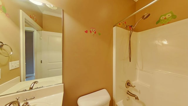 bathroom featuring ornamental molding, toilet, and shower / washtub combination