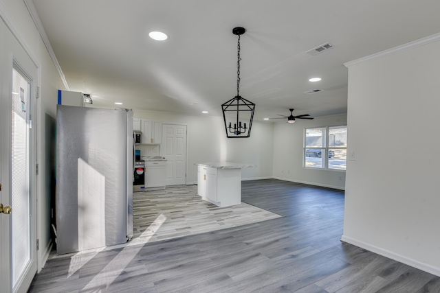 2140 Chadwick Rd, Augusta, GA 30906 - interior space featuring recessed lighting, visible vents, crown molding, open floor plan, and white cabinetry