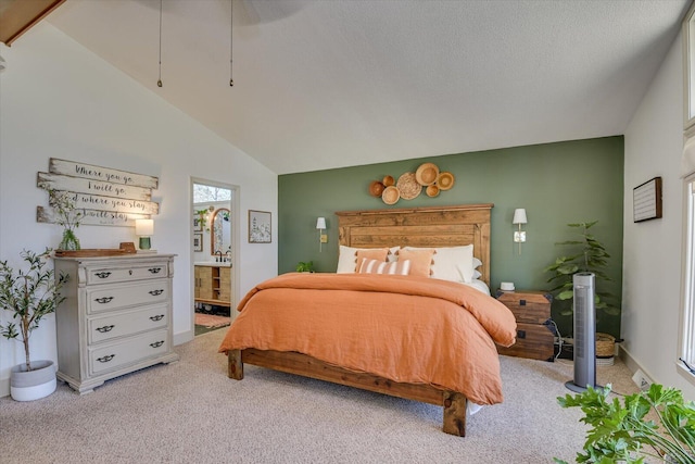 bedroom featuring connected bathroom, baseboards, carpet, lofted ceiling, and a textured ceiling