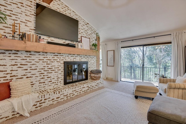 carpeted living room featuring lofted ceiling and a brick fireplace